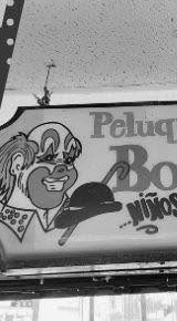 Rótulo de la Peluquería Bombín